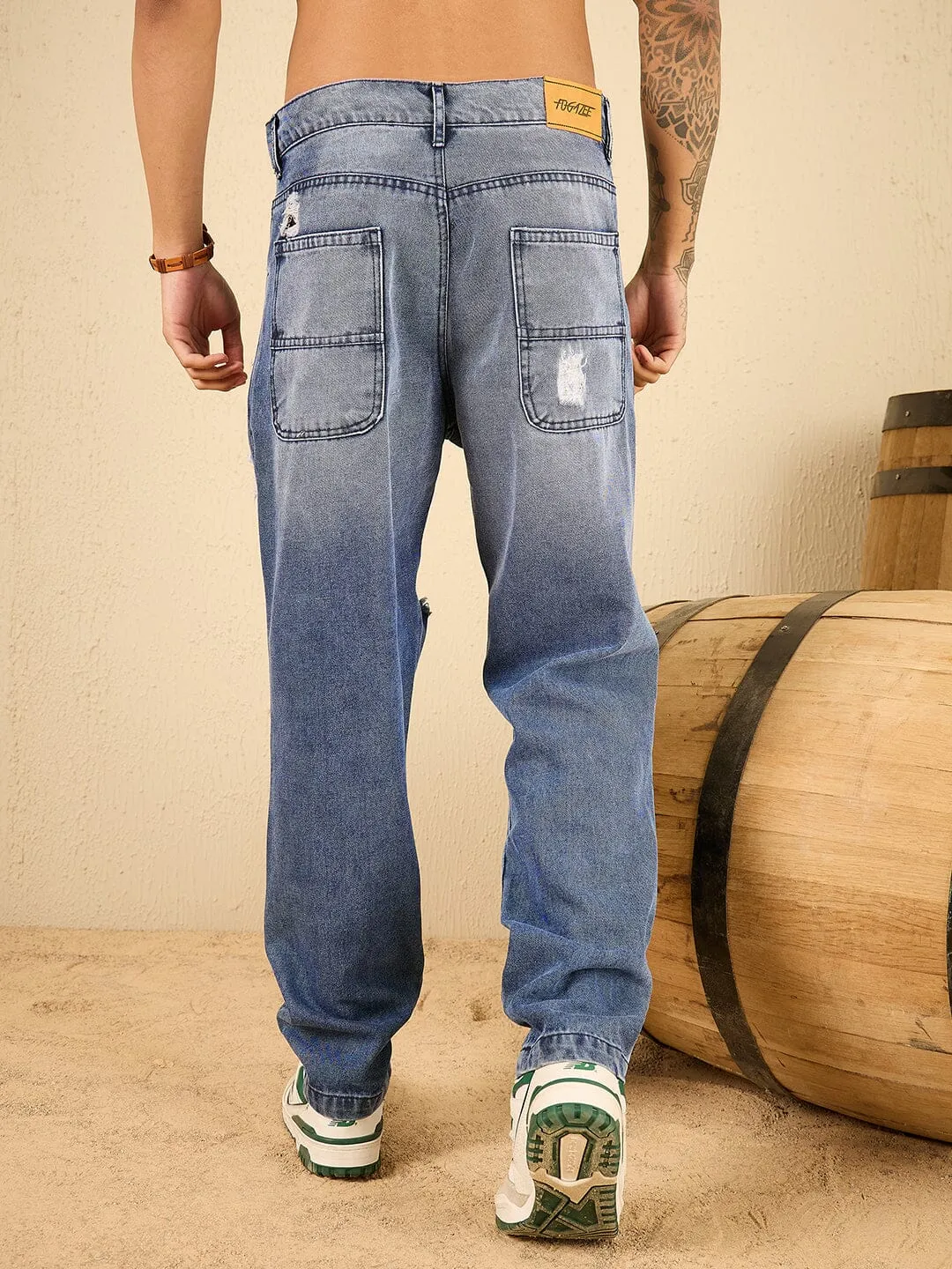 Mid Wash Blue Knee Ripped Relaxed Tapered Fit Jeans